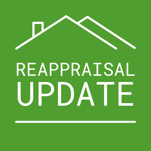 green text graphic saying Reappraisal Update with an outline of a roof
